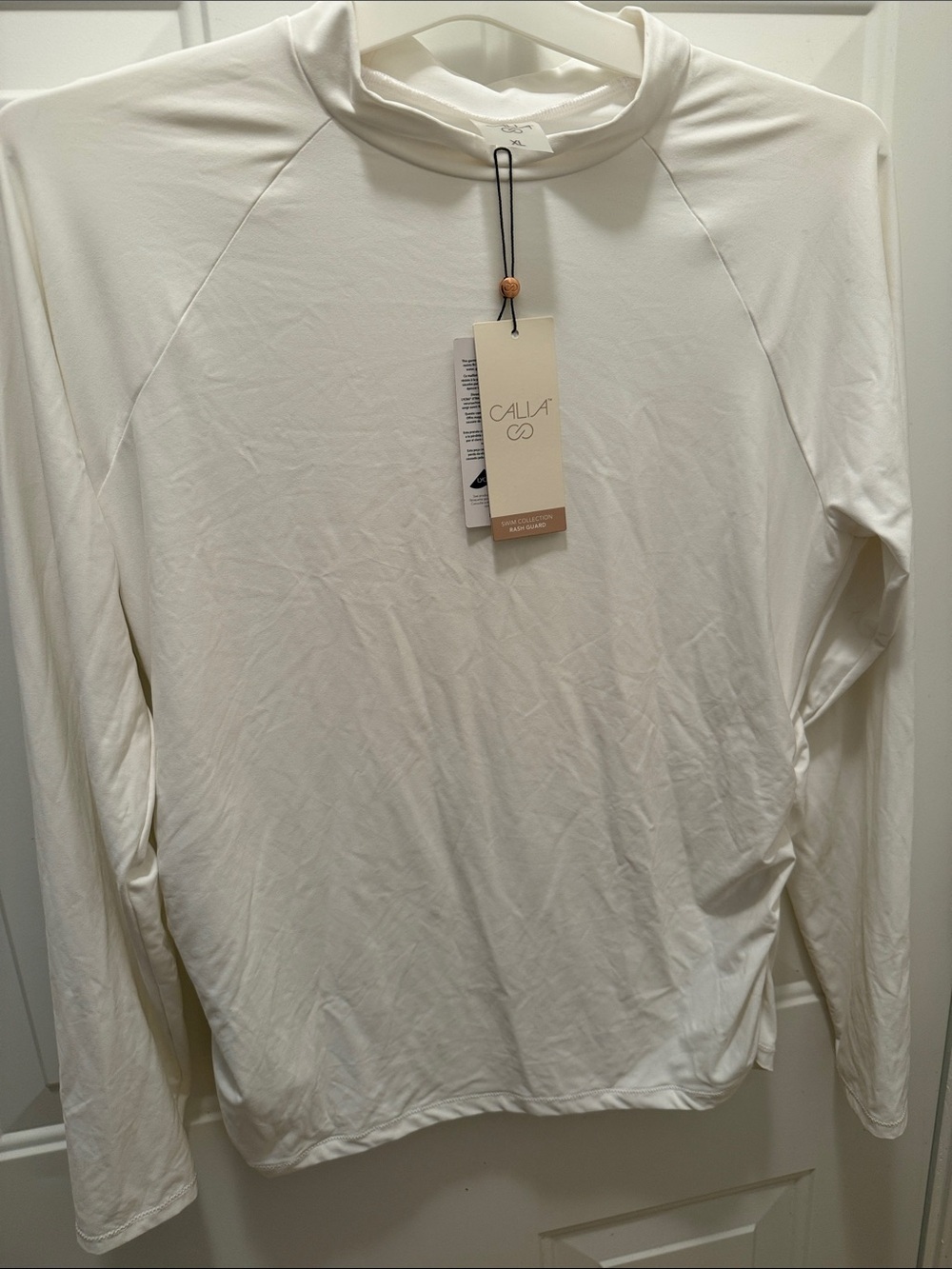 Alia White Tag with Brown Accent